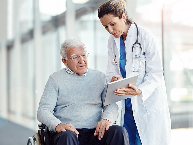 doctor with elderly patient 