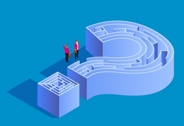 Two business people navigating through a maze shaped as a question mark